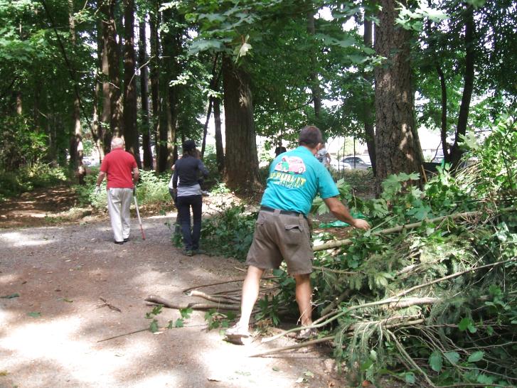 Volunteers clear brush, improve visibility